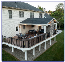 white house with an ornate deck